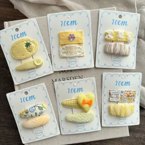 Cute yellow fabric hair clips for kids, sweet handmade side clips, floral and bow hair accessories