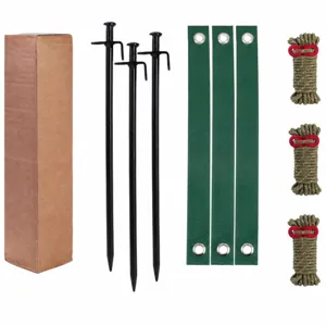 Heavy duty tree staking kit with stakes, green straps and reflective ropes for wind support.