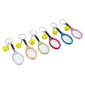 Colorful metal tennis racket keychain set, cute sports souvenir accessory for bags and keys.