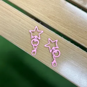 Pink star shaped lobster clasp swivel keychain DIY handmade jewelry accessories detail shot.
