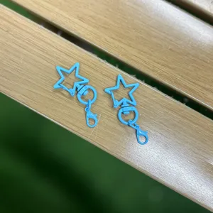 Blue star lobster clasp keychain detail showing the rotating hardware for DIY crafts.