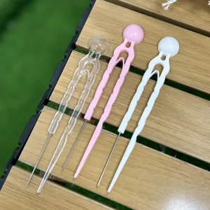 Kit d'outils stylo et aiguille pour perles à repasser avec poignées roses et blanches.