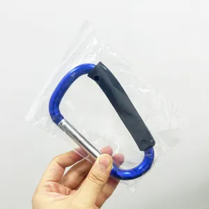 Blue aluminum alloy D-shaped carabiner with black foam handle for outdoor climbing and hiking.