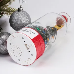 Christmas tree message in a bottle with voice recording function and festive baubles.