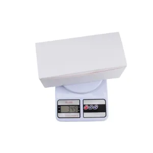 Detailed white packaging box for the Christmas voice recording gift, shown weighing 349g on scale.