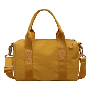 Stijlvolle gele nylon Boston tas voor dames, grote praktische crossbody en handtas.