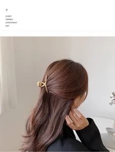 Molla per capelli incrociata in metallo dorato per donna elegante accessorio di stile