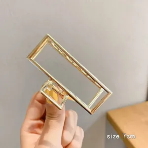 Molla per capelli rettangolare in metallo dorato da donna, accessorio geometrico elegante 7cm.