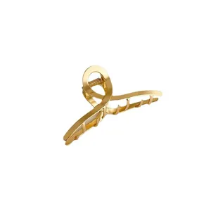 Morsetto per capelli in metallo dorato media clip a griffe incrociata elegante donna