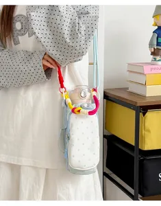 Korean dopamine colorful polka dot canvas crossbody water bottle bag for daily outdoor use.