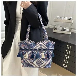 Bohemian fringe woven tote bag with geometric patterns and double handles for women daily style.