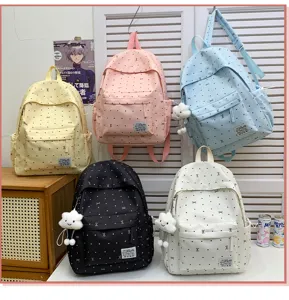 Sac à dos décontracté à pois doux de style japonais pour étudiants avec joli nœud.