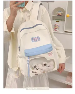 Farbenfroher Studenten Rucksack mit transparenter Tasche und süßen Plüschtieren.