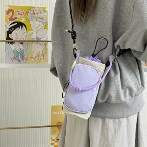 Lightweight drawstring water bottle bag, stylish contrast cross body bag for outdoor daily use.