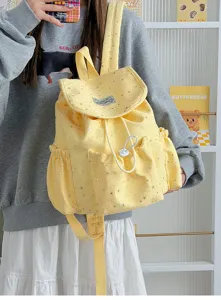 Cute Japanese style yellow canvas backpack with star pattern for student daily casual use.
