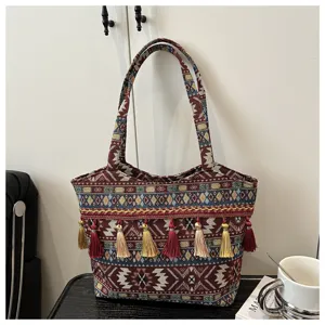 Ethnic style woven stripe tote bag with tassels, fashion vintage casual shoulder handbag for women.