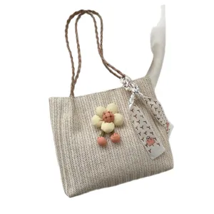 Casual woven straw tote bag for women, stylish shoulder bag with cute flower and scarf.