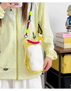 Korean dopamine colorway drawstring crossbody phone bag and water bottle bag detail shot.