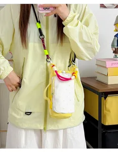 Korean style dopamine color block drawstring crossbody phone bag for women outdoor shopping