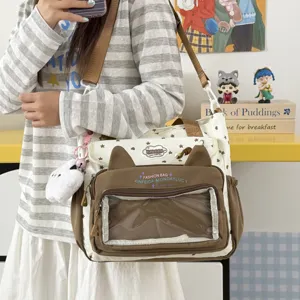 Bolso de hombro de gran capacidad estilo japonés con orejas de gato y bolsillo transparente.