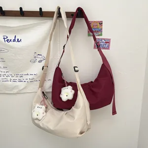 Casual nylon shoulder bag for women, minimalist crossbody hobo bag for daily travel and work.
