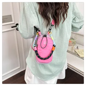 Stylish color block braided strap mini crossbody bag for women, perfect for outdoor fashion use.
