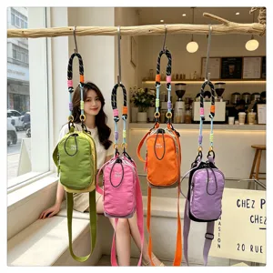 Stylish contrast color woven crossbody bag for women, trendy mini phone bag for outdoor use.