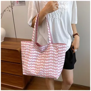 Stylish pink wavy pattern nylon tote bag for women, large capacity casual shoulder bag.