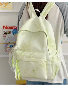 Zaino casual verde chiaro con stampa di stelle per studenti, elegante zaino da viaggio.
