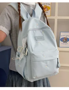 Cute bow embroidery student backpack, stylish large capacity casual daypack for teens.