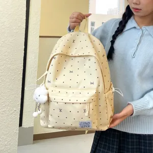 Sac à dos en toile à pois doux de style japonais pour école voyage léger décontracté