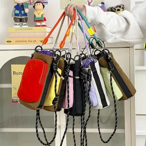 Lightweight colorful drawstring crossbody bag, fashion color block water bottle holder phone bag