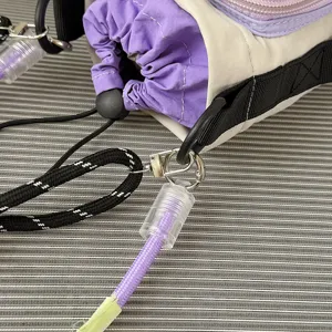 Lightweight outdoor drawstring water bottle bag detail shot with metal hardware and strap.