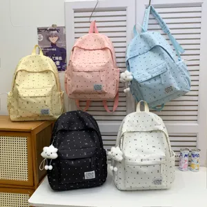 Sac à dos casual à pois de style japonais, léger et grande capacité pour étudiants.