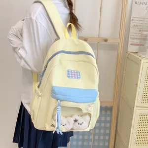 Hübscher pastellfarbener Segeltuch Schulrucksack mit transparenter Fronttasche für Alltag