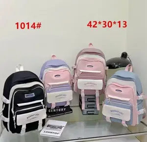 Colorblock school backpack detail showing multiple vibrant color options and large capacity design.