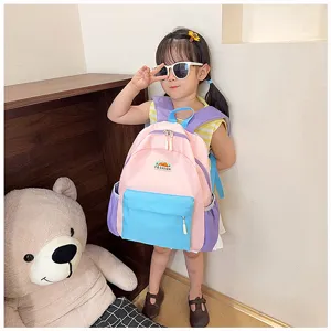 Colorful kids backpack for school and travel, stylish color block design with comfortable straps.