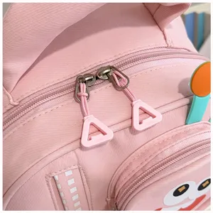 Pink cute cartoon kids backpack detail view, ideal for kindergarten boys and girls daily use.