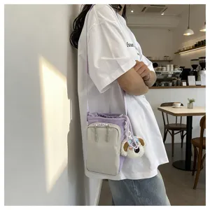 Detail view of the stylish colorblock phone crossbody bag showcasing daily wear style.