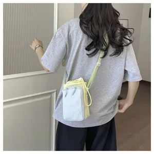 Korean dopamine color-blocking phone crossbody bag detail, casual shoulder bag with pocket.