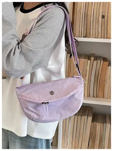 Lightweight purple commuter dumpling crossbody bag detail view, casual shoulder bag style.