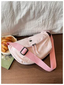 Solid color casual dumpling shoulder bag detail shot, lightweight crossbody bag for women.