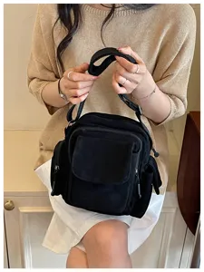 Sac bandoulière noir décontracté multi-poches en toile, sac porté épaule pratique et élégant.