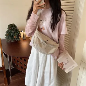 Lightweight crescent shoulder bag for women, casual nylon crossbody commuting handbag.