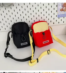 Mini bolso bandolera de lona para teléfono, bolso informal bonito de dos colores para exterior.