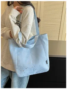 Light blue star print canvas tote bag, casual daily shoulder handbag with front pocket.