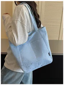 Blue star print tote bag detail view, casual large capacity shoulder bag for daily commute.
