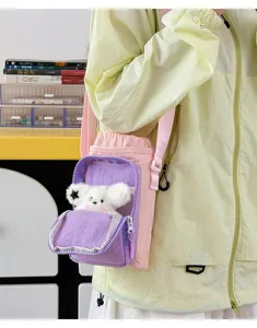 Color-blocked water bottle bag detail view, lightweight crossbody cute bag for daily outdoor use.