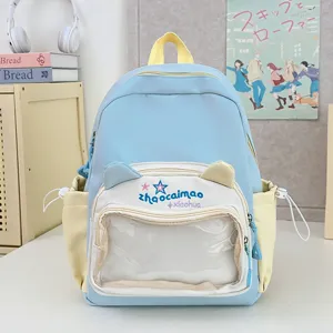 Mochila azul claro bonita con bolsillo frontal transparente, diseño de orejas de gato y gran espacio.