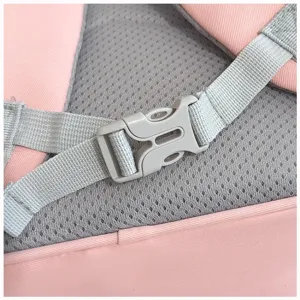 Close-up of pink children backpack strap buckle and breathable mesh back padding detail.